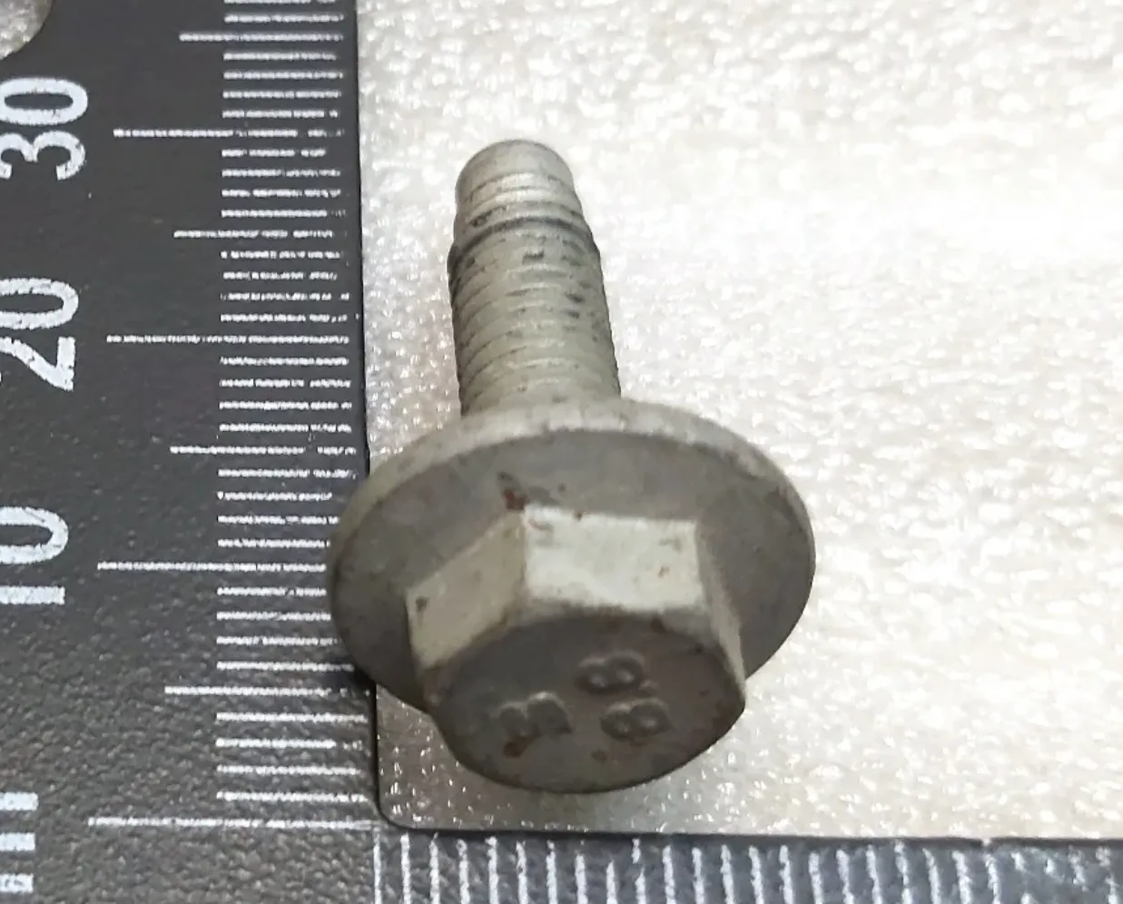 1139785-00-A Болт шестигранний з фланцем HF M6-1.0×21 клас міцності 8.8 сталь G1009[B] з покриттям MAT BOLT