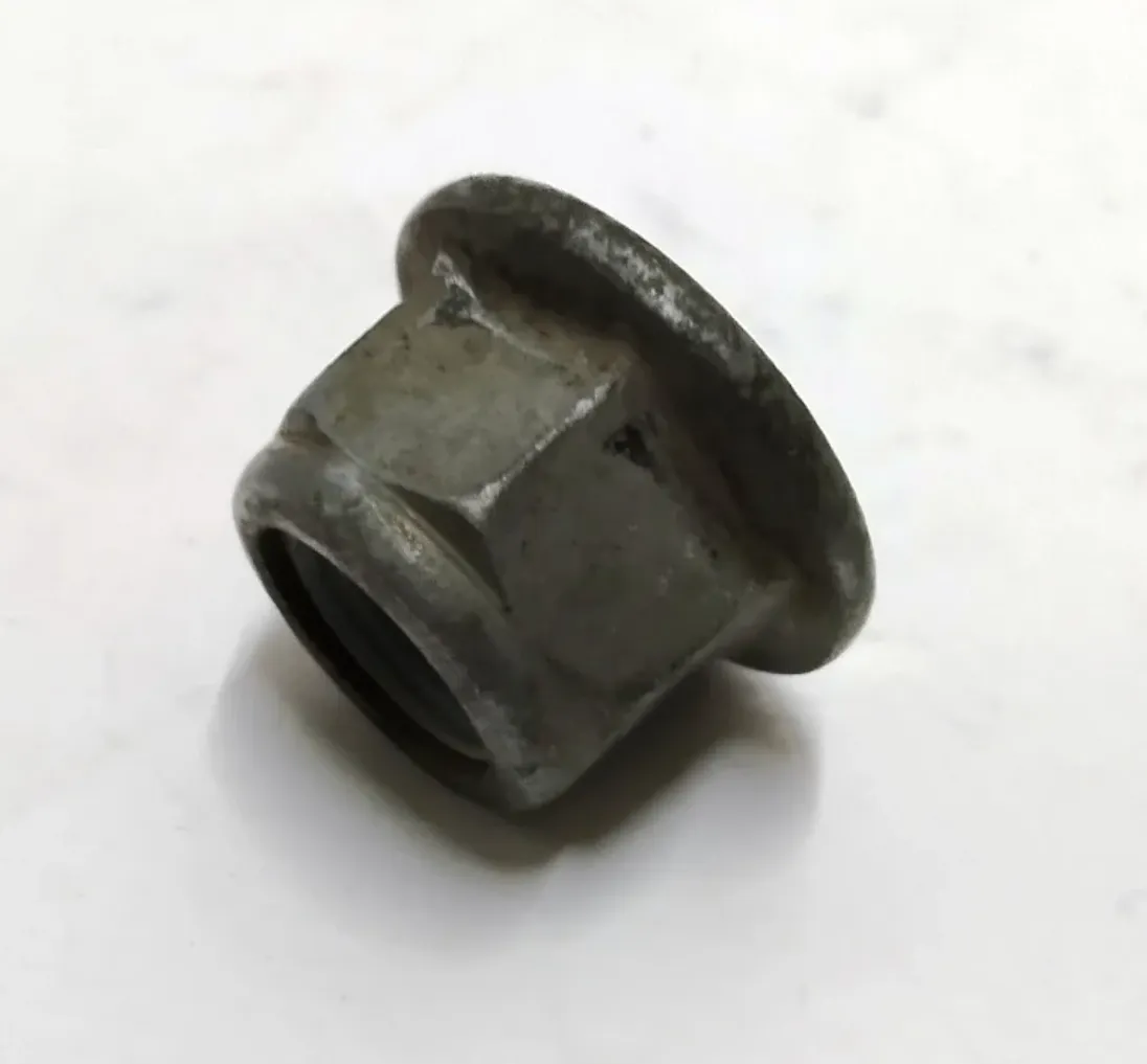 1111542-00-A Фланцева шестигранна гайка M10×1.25 клас міцності 10 з цинково-нікелевим покриттям (ZnNi) PTP NUT