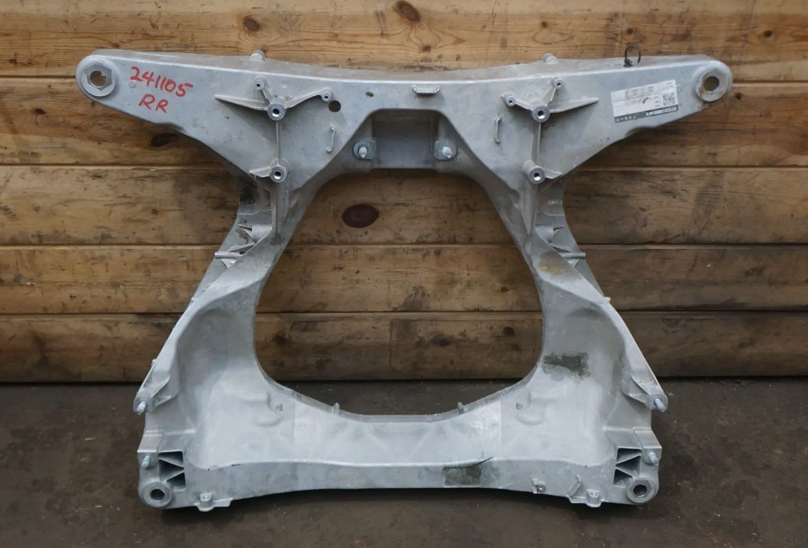 1250561-00-A Задній підрамник – тримоторна версія REAR SUBFRAME – TRIMOTOR