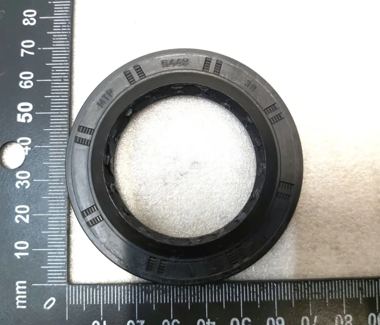 1065932-00-A Ущільнення вихідного (привідного) мосту OUTPUT AXLE SEAL