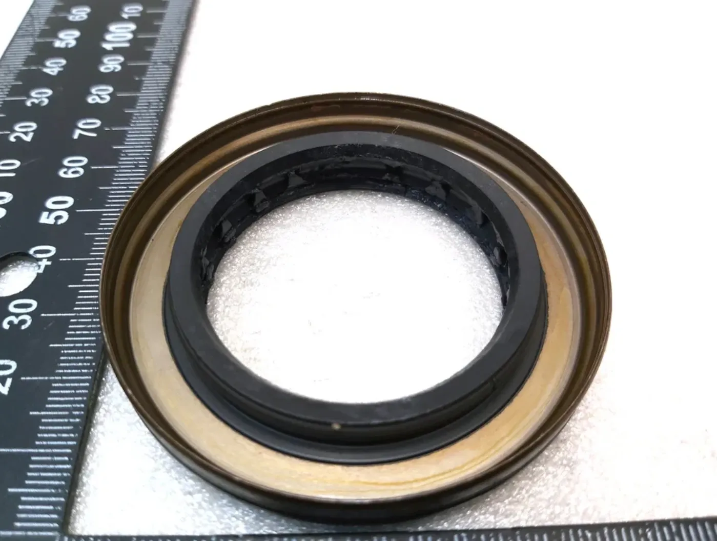 1065932-00-A Ущільнення вихідного приводу OUTPUT AXLE SEAL