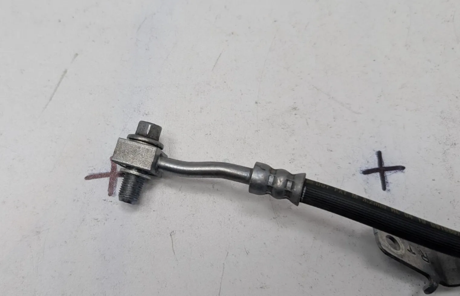 1250731-00-D Гальмівний шланг у зборі – задній – ліва сторона BRAKE HOSE ASSEMBLY – REAR – LEFT HAND