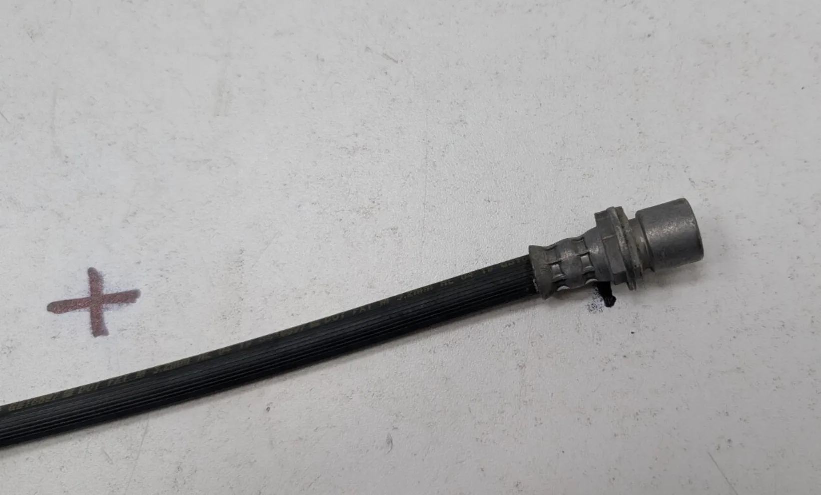 1250731-00-D Гальмівний шланг у зборі – задній – ліва сторона BRAKE HOSE ASSEMBLY – REAR – LEFT HAND