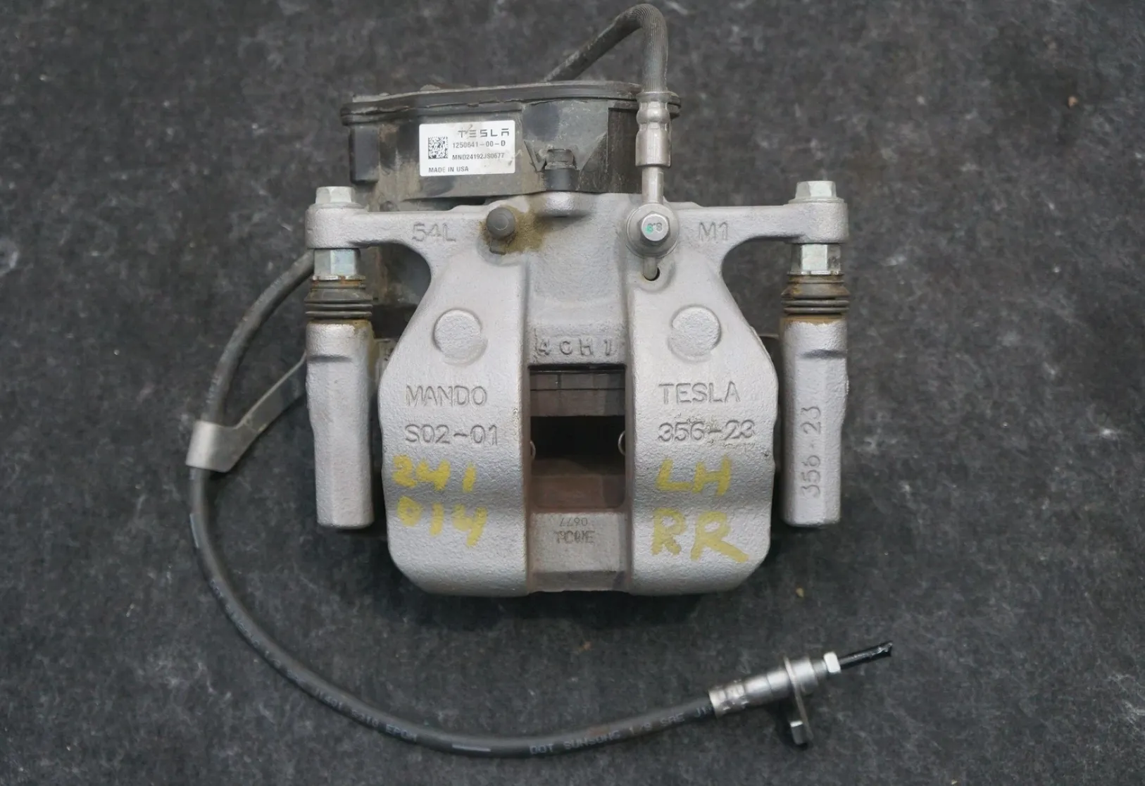 1250641-00-D Задній гальмівний супорт – ліва сторона REAR BRAKE CALIPER – LEFT HAND