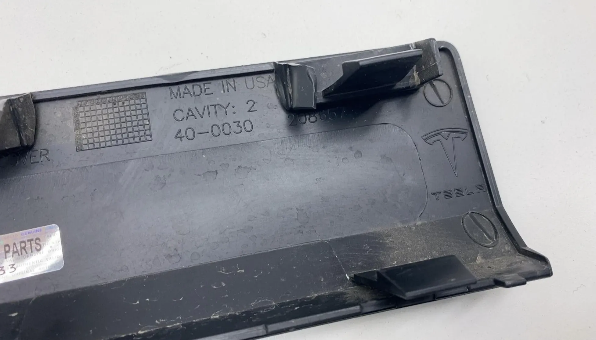 1815251-00-B Нижня заглушка номерного майданчика передньої панелі FRONT FASCIA LOWER DUMMY LICENSE PLATE COVER