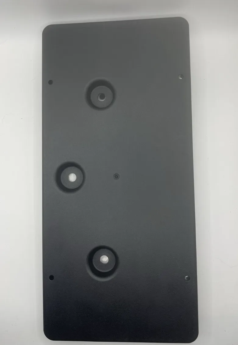 1738004-00-B Передній кріплення (або комплект) номерного знака FRONT LICENSE PLATE ASSEMBLY