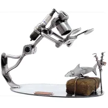 Schraubenmännchen Taucher mit Kamera bei der Unterwasserfotografie Schraubenmännchen Taucher mit Kamera bei der Unterwasserfotografie