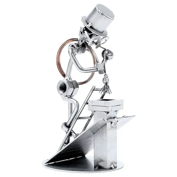 Schraubenmännchen Kaminkehrer oder Schornsteinfeger auf dem Dach Schraubenmännchen Kaminkehrer oder Schornsteinfeger auf dem Dach