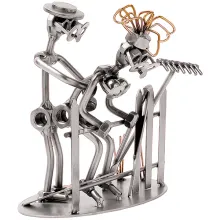 Schraubenmännchen - Paar bei der Liebe am Zaun Schraubenmännchen - Paar bei der Liebe am Zaun