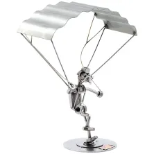 Schraubenmännchen Gleitschirmflieger bei der Landung Schraubenmännchen Gleitschirmflieger bei der Landung