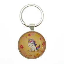 Schlüsselanhänger mit sitzendem Einhorn orange Schlüsselanhänger mit sitzendem Einhorn orange