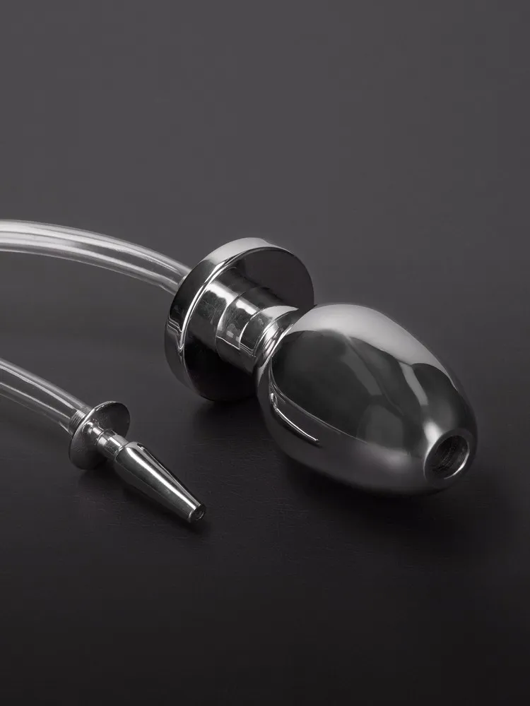 Triune Fire Hose: Edelstahl-Penisplug mit Schlauch und Analplug Triune Fire Hose: Edelstahl-Penisplug mit Schlauch und Analplug