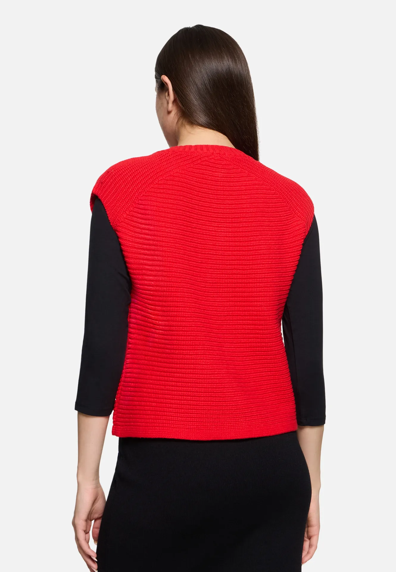 Grobstrickjacke ohne Arm Grobstrickjacke ohne Arm