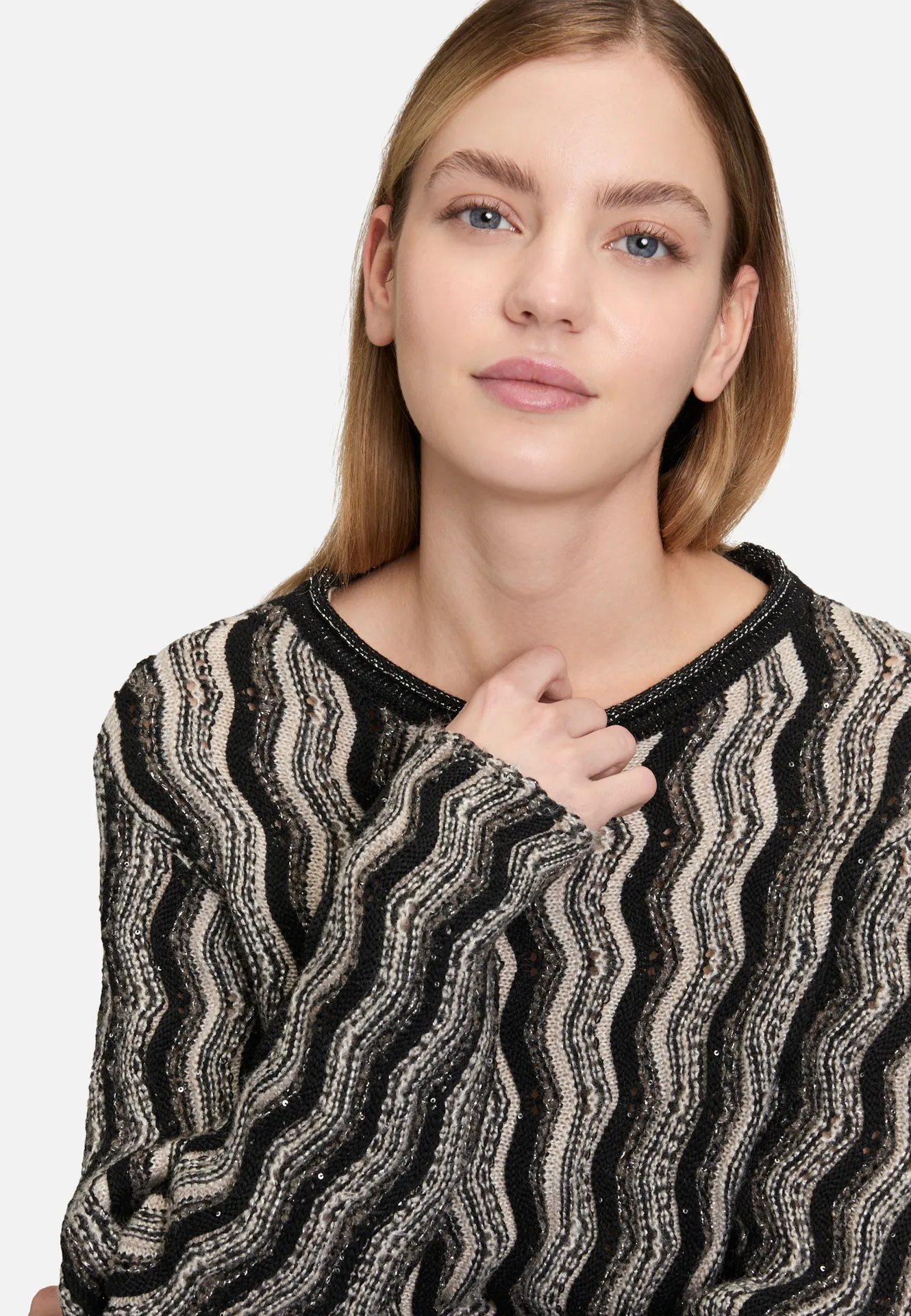 Strickpullover mit Pailletten Strickpullover mit Pailletten