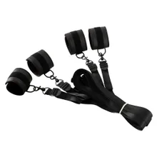 Bettfessel-Set mit Hand- und Fußfesseln in stilvoller Lederoptik Bettfessel-Set mit Hand- und Fußfesseln in stilvoller Lederoptik