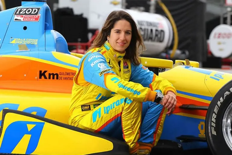 Bia Figueiredo in her race suit