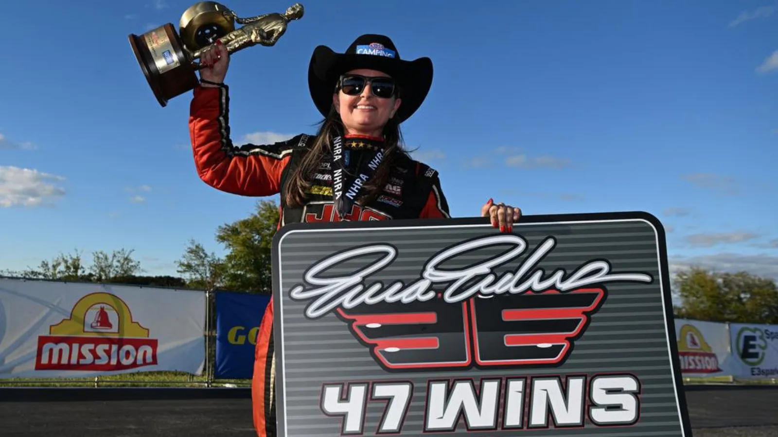 Erica Enders with trophy for win 47
