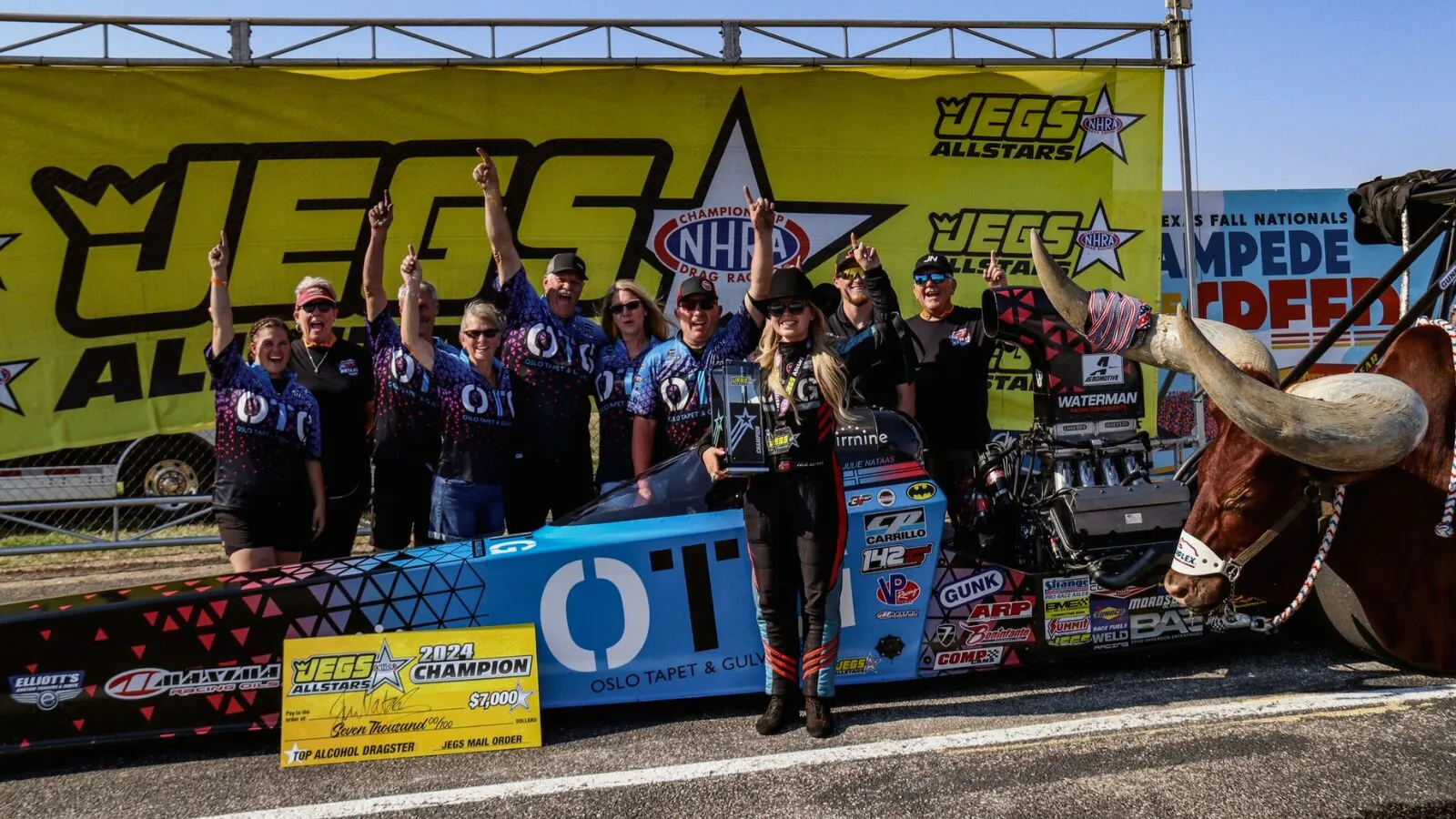 Julie Nataas and her team celebrating her win