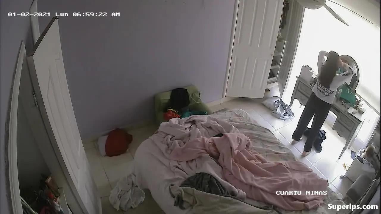 IPCAM – Petite Hispanic girl gets dressed in her room IPCAM – Petite Hispanic girl gets dressed in her room