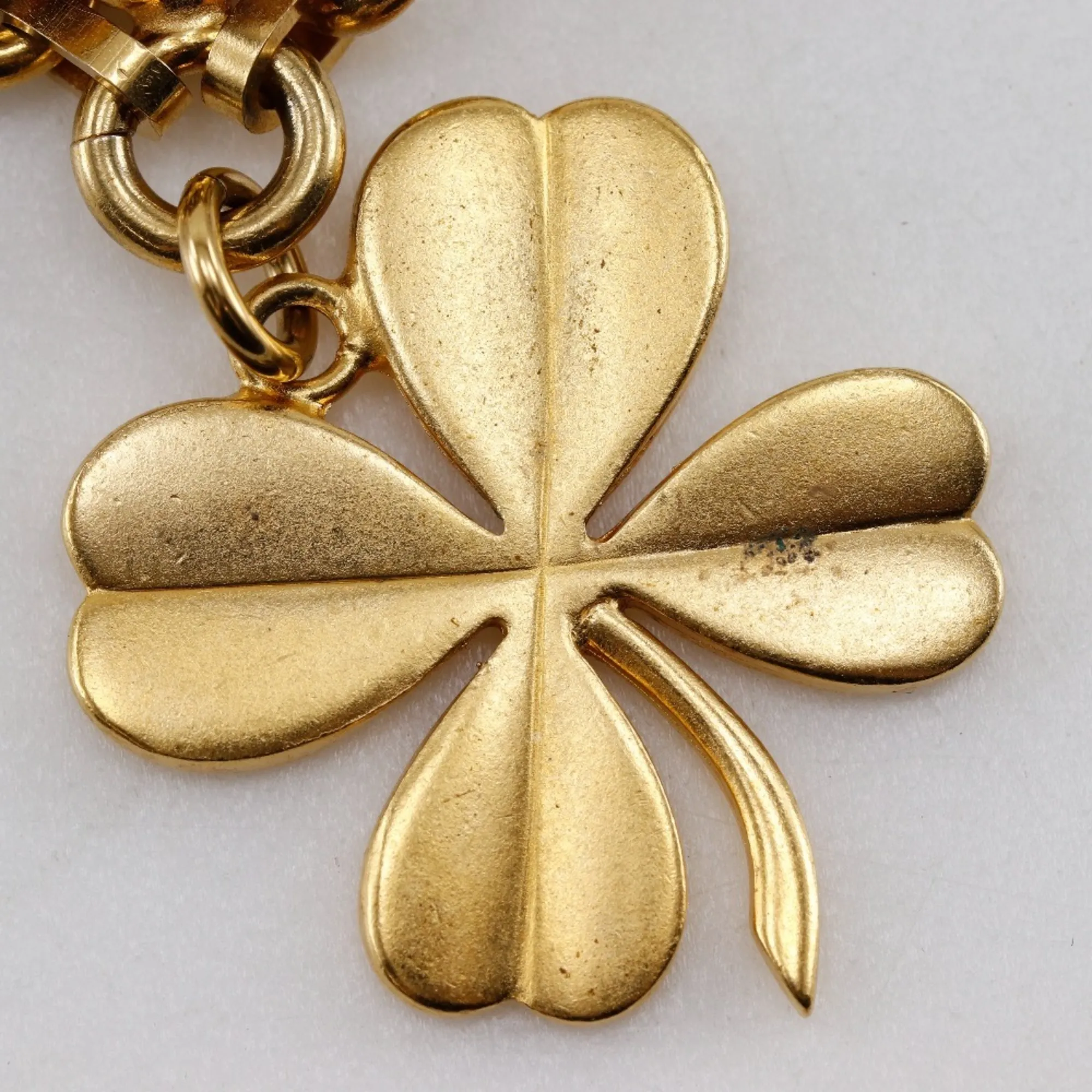 CHANEL Gold Logo Brooch