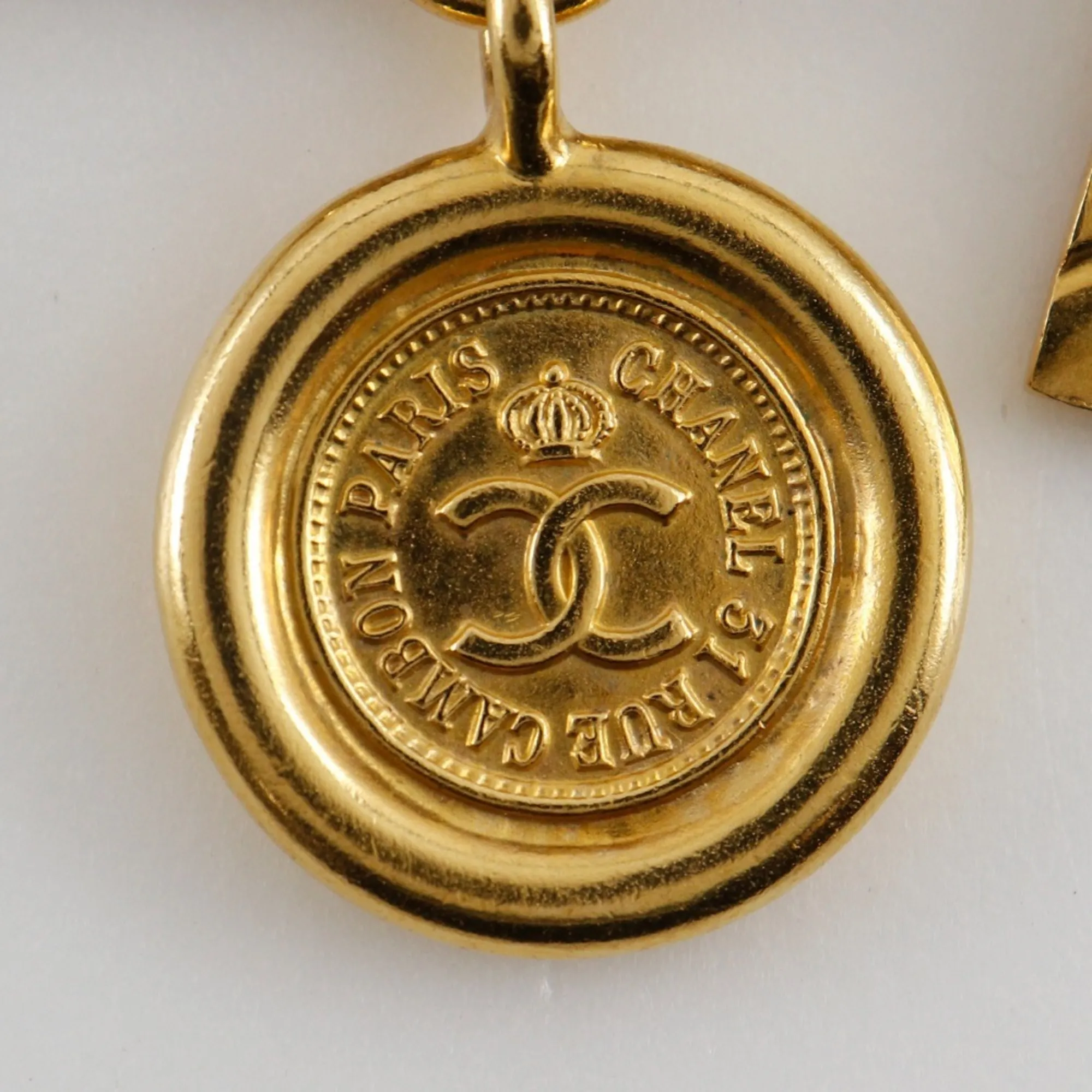 CHANEL Gold Logo Brooch