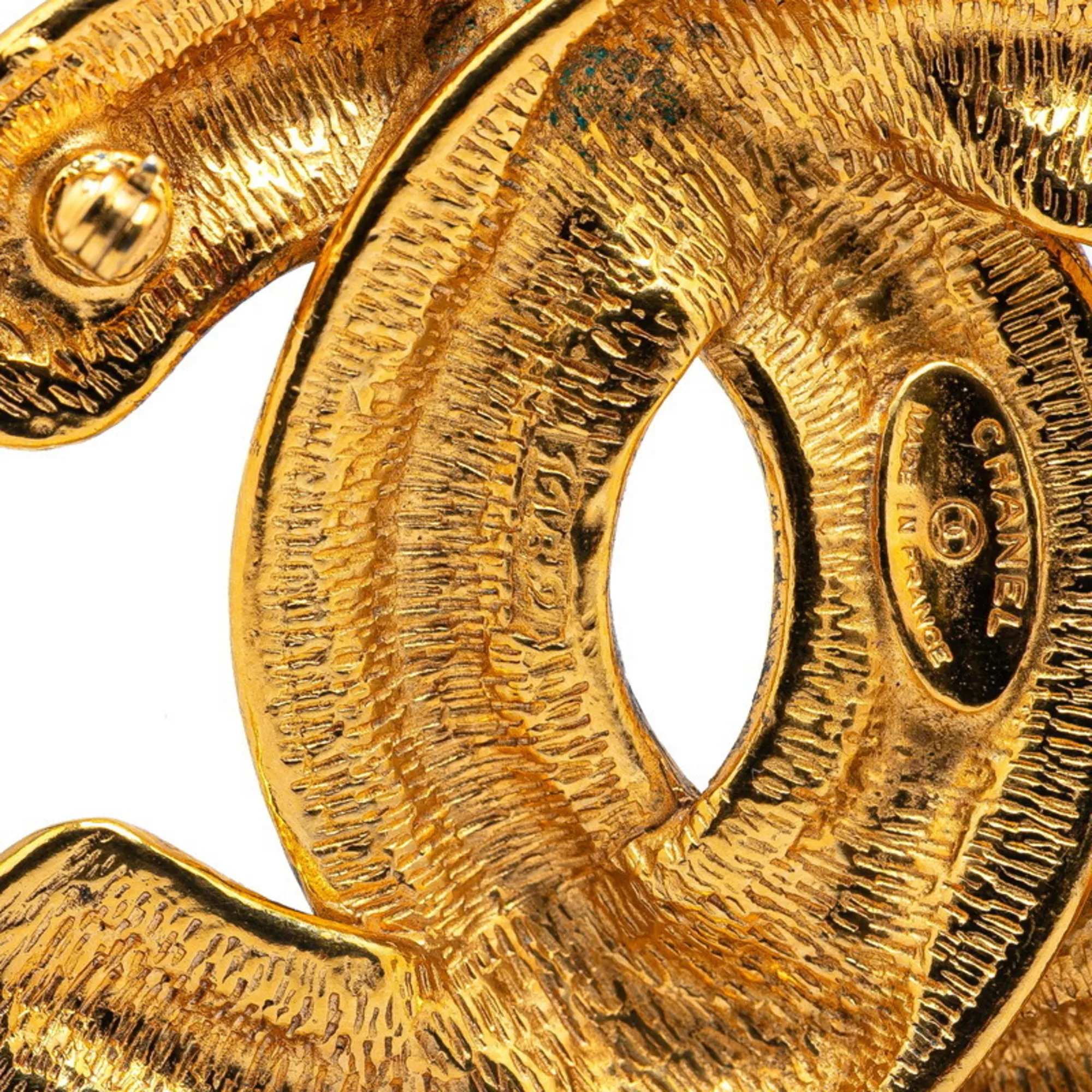 CHANEL Gold Logo Brooch