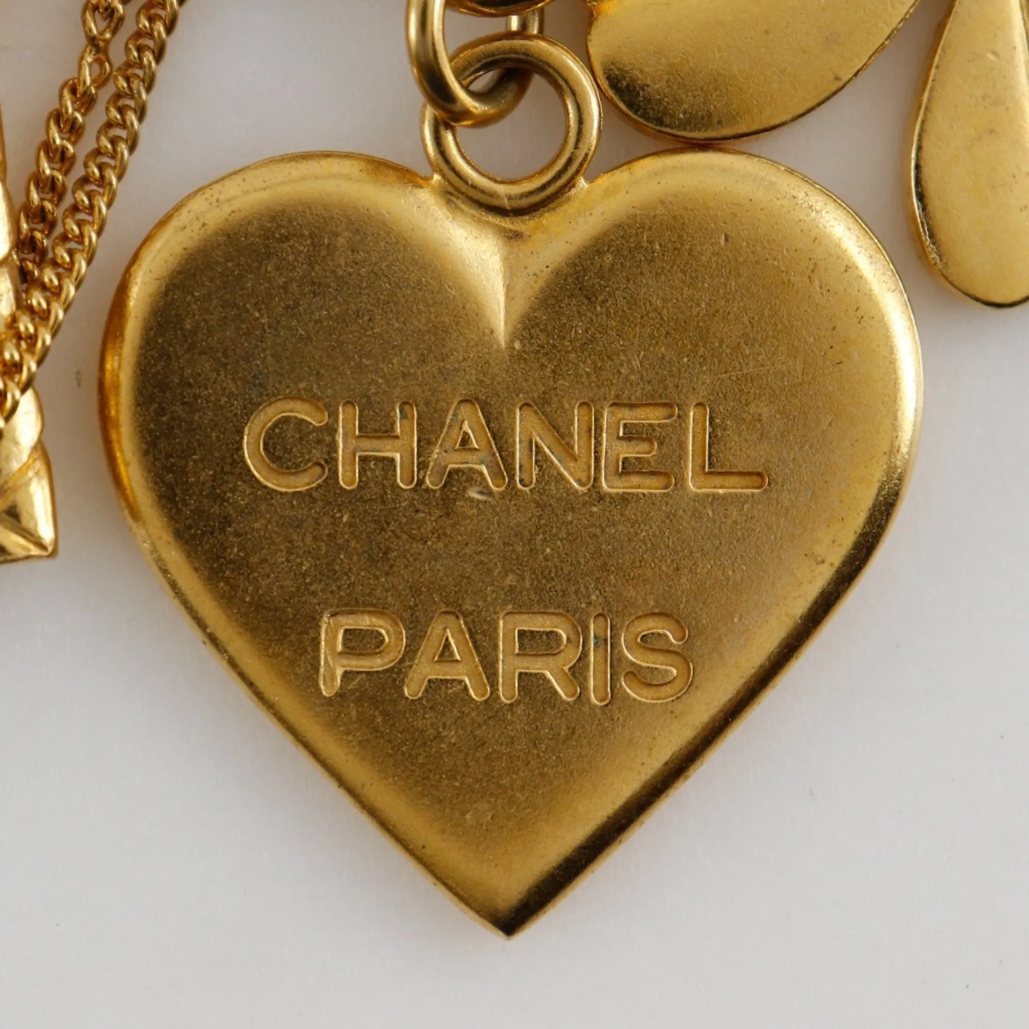 CHANEL Gold Logo Brooch