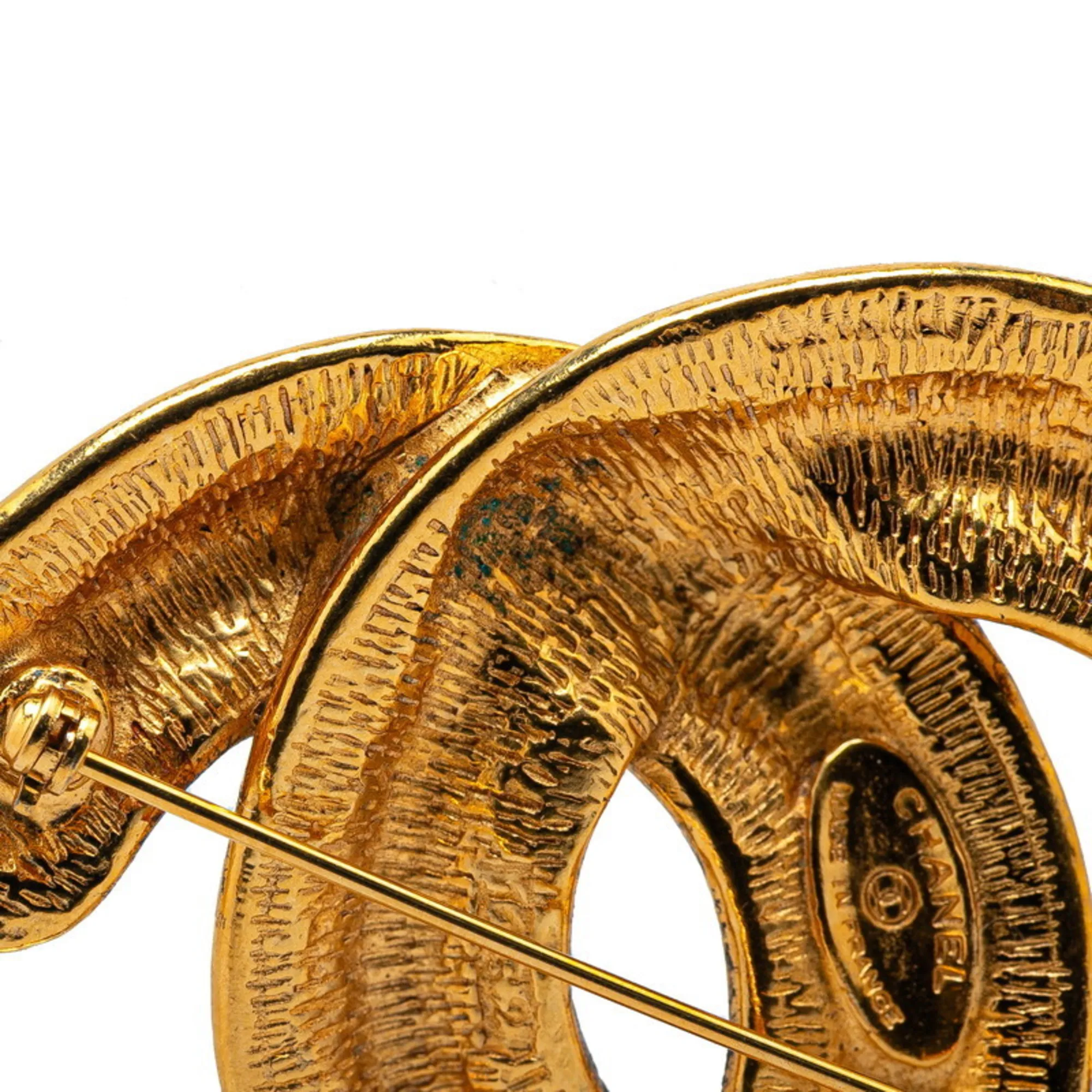 CHANEL Gold Logo Brooch