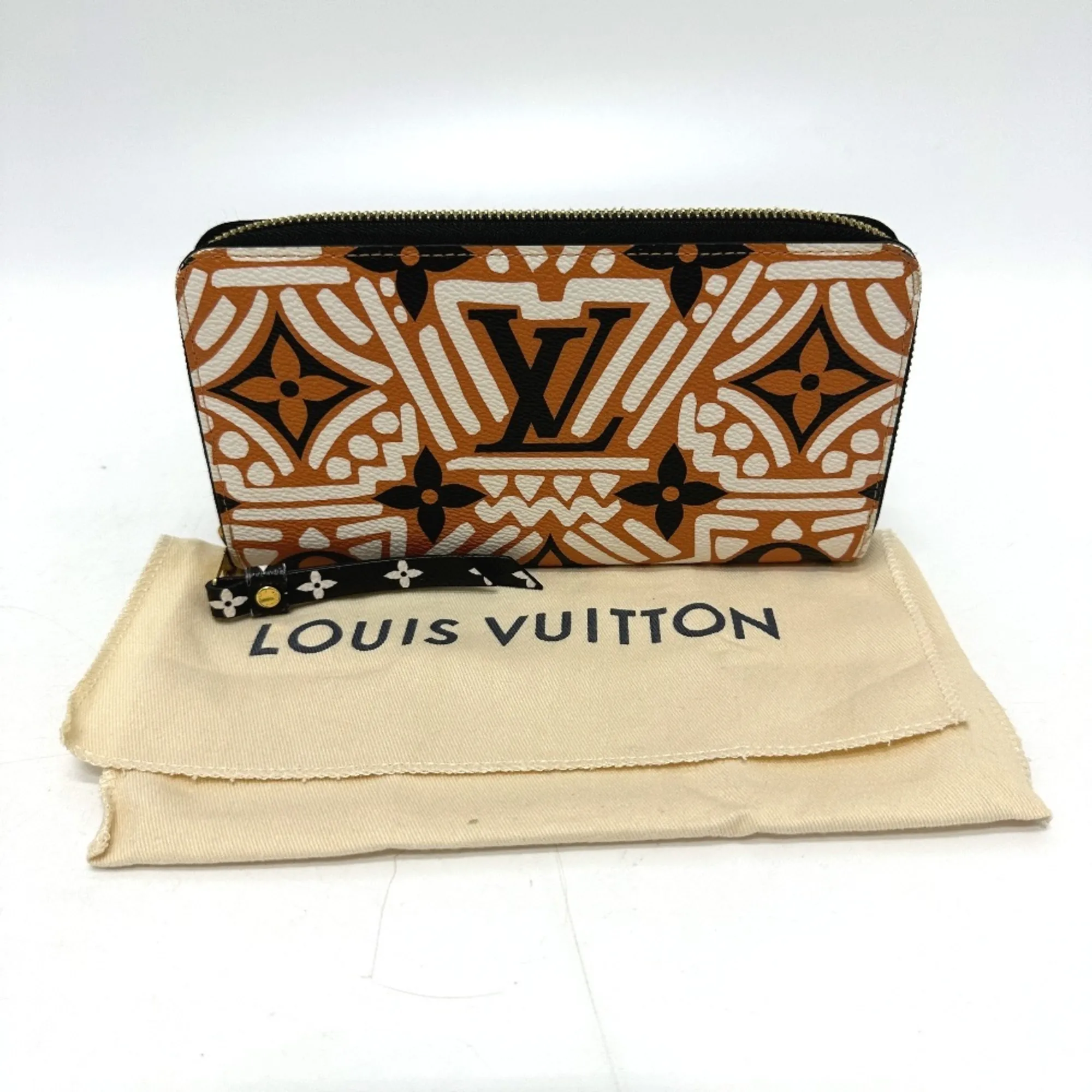 LOUIS VUITTON Brown Monogram Wallet