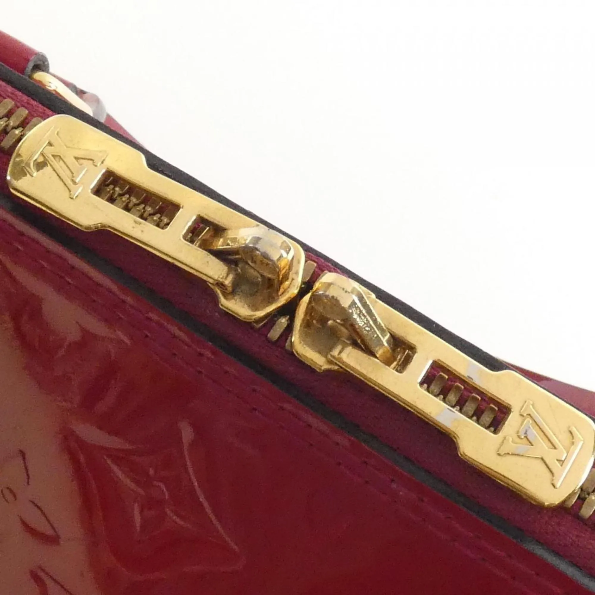 LOUIS VUITTON Gold Alma Bag