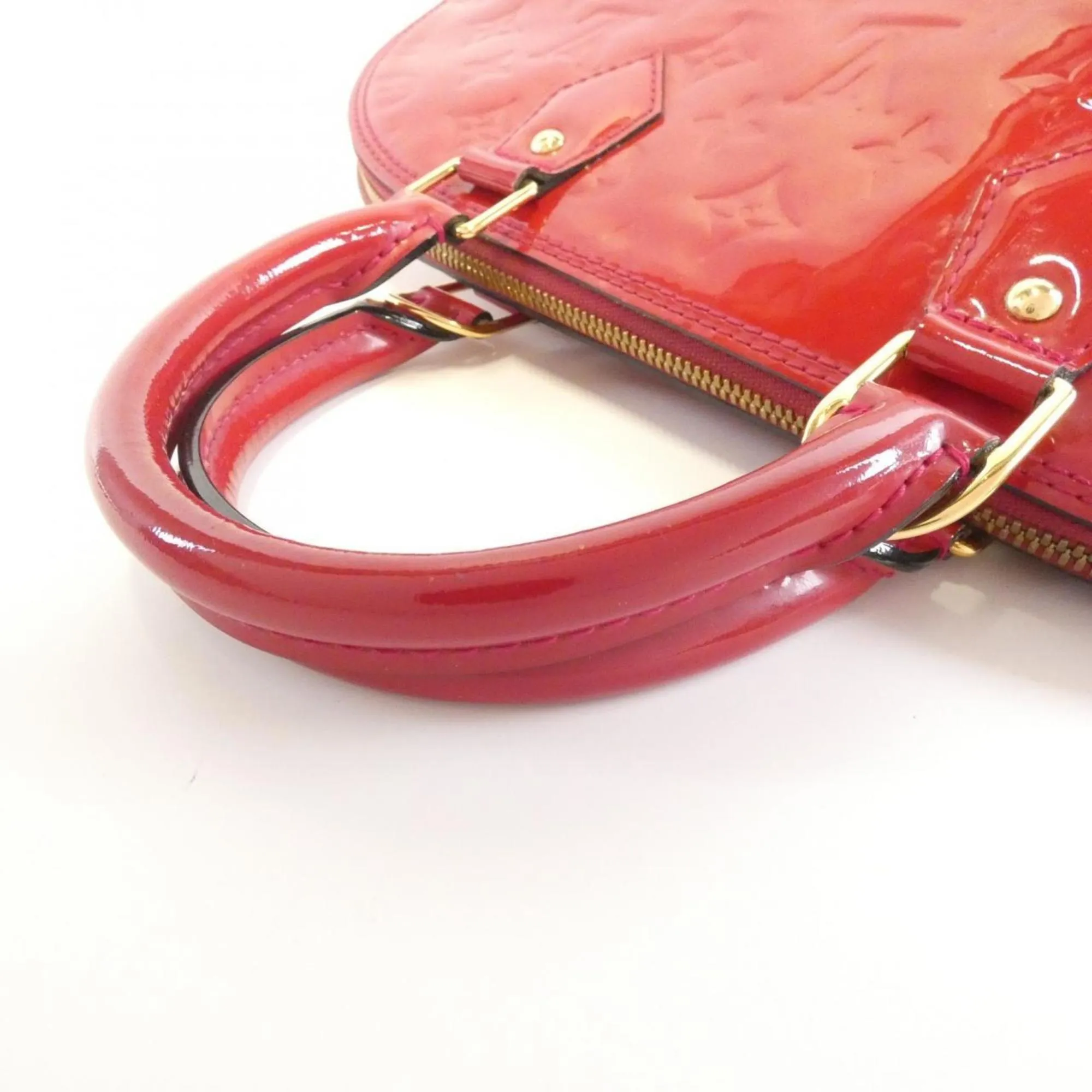 LOUIS VUITTON Gold Alma Bag