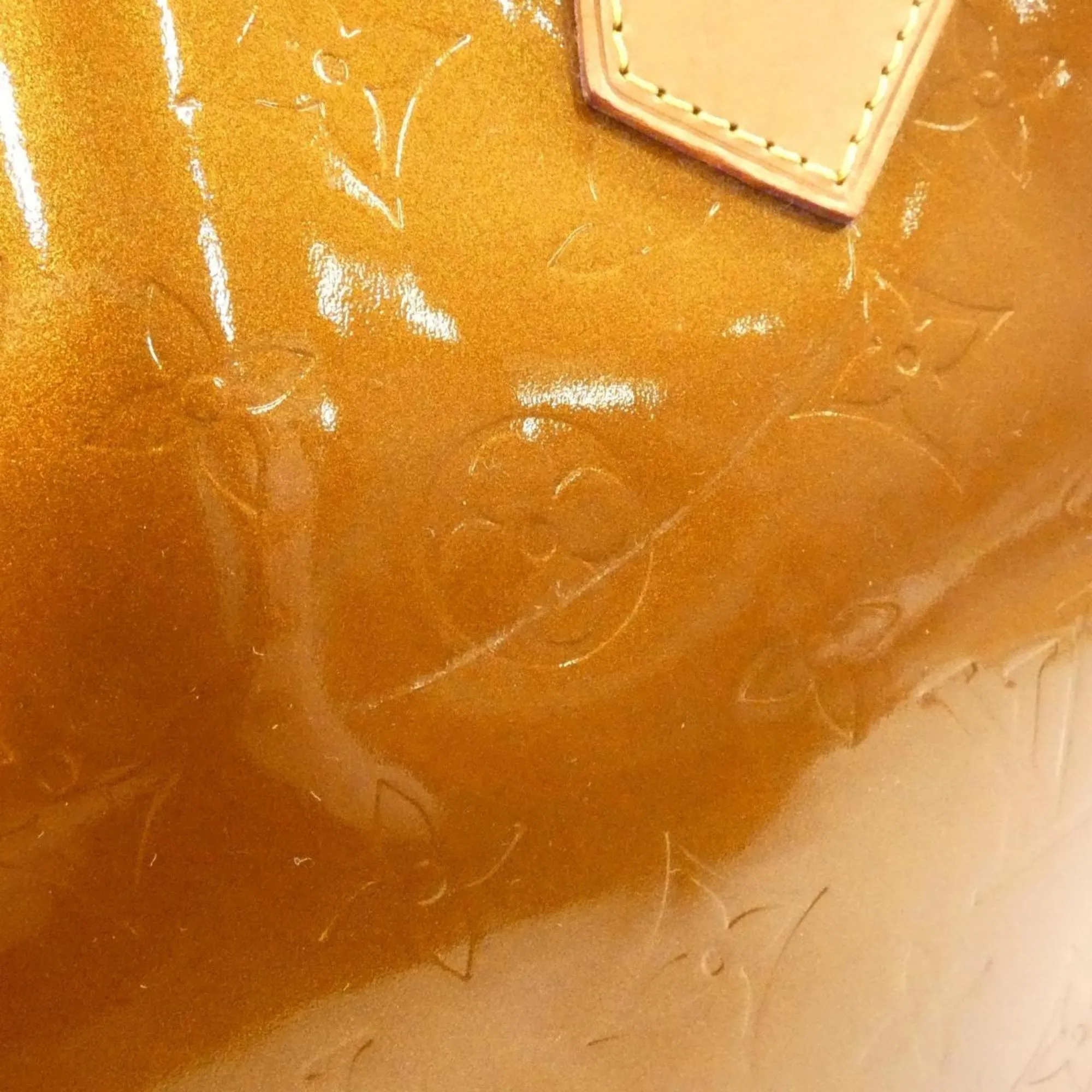 LOUIS VUITTON Gold Shoulder Bag